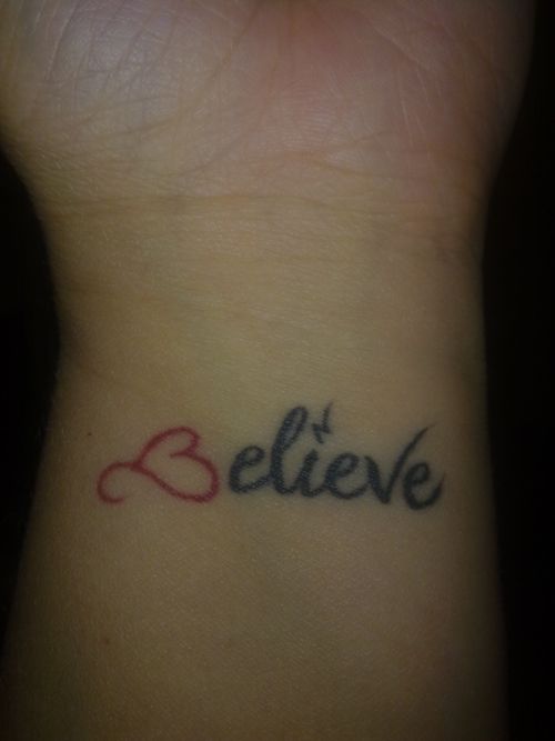 Believe red and black heart tattoo