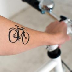 Bicycle tattoo on hand