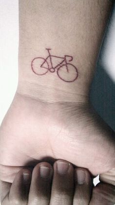 Bicycle tattoo on wrist