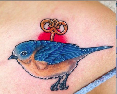 Bird and key incredible tattoo