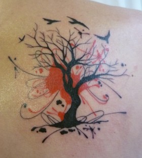 Birds and red tree tattoo on shoulder