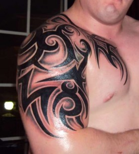 Black adorable tribal tattoo on arm