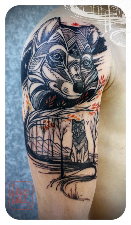 Black adorable wolf tattoo on arm