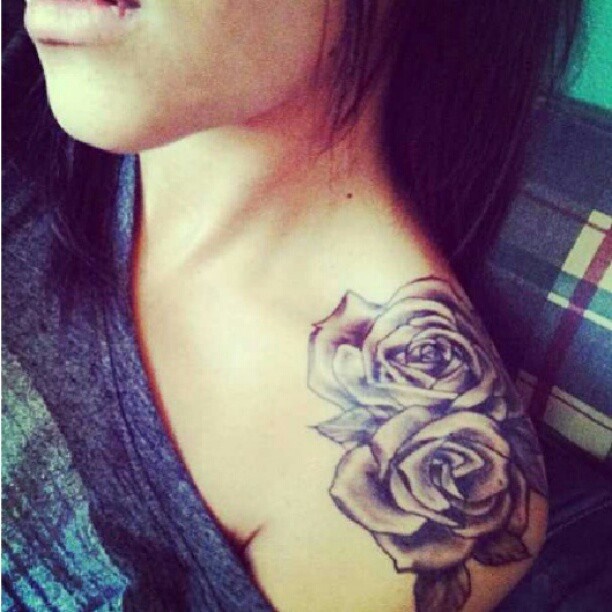 Black and white girl rose tattoo on shoulder