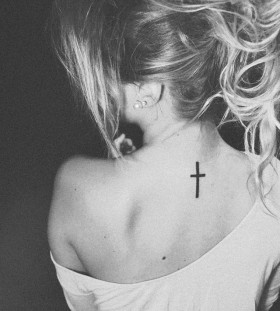 Black and white style back cross tattoo