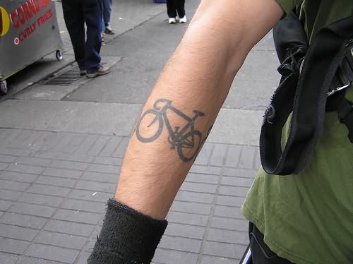 Black cute bicycle tattoo on arm