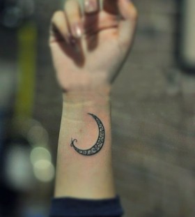 Black cute moon tattoo on arm