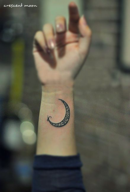 Black cute moon tattoo on arm