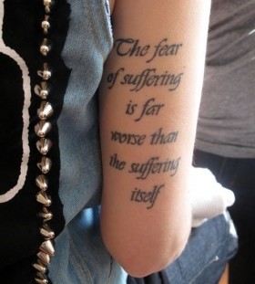 Black cute quote tattoo on arm