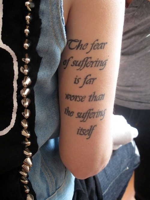 Black cute quote tattoo on arm