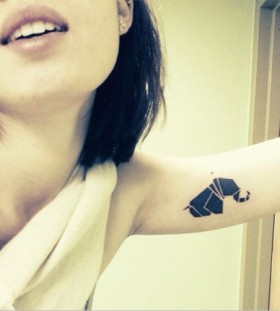 Black elephant origami tattoo on arm