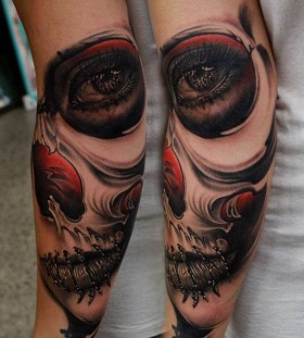 Black eyes skull tattoo on shoulder