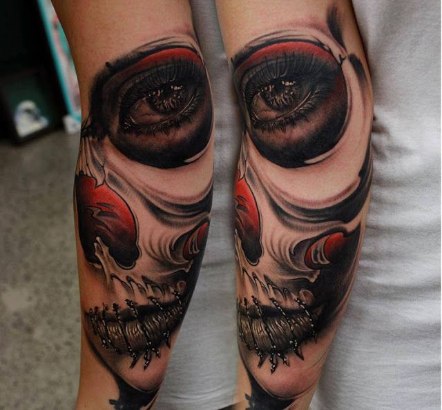 Black eyes skull tattoo on shoulder