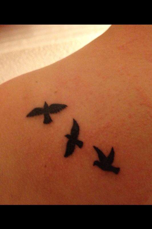 Black lovely bird tattoo