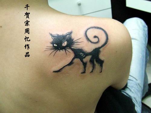 Black lovely cat tattoo on arm