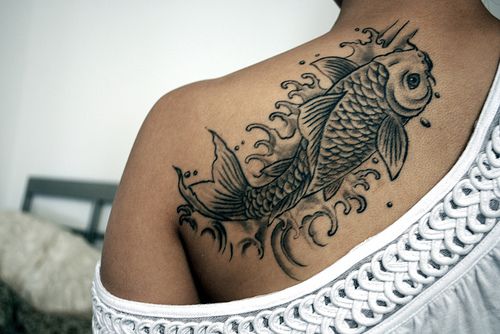 Black lovely girl fish tattoo on arm