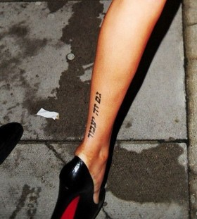Black lovely women's quote tattoo on leg