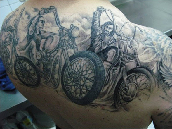 Black men’s bicycle tattoo on back