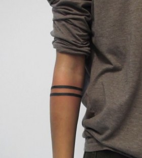 Black men's line tattoo on arm