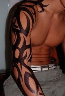 Black men's tribal tattoo on arm