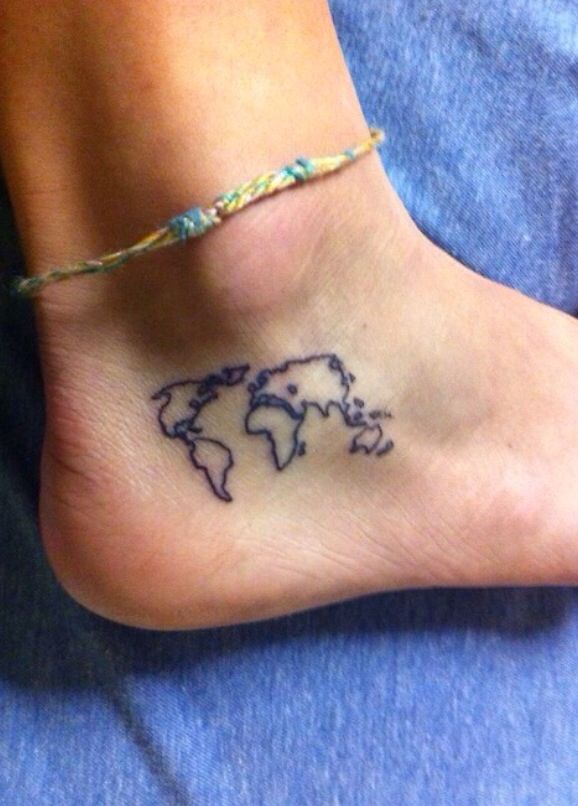 Black mundo map tattoo on legs