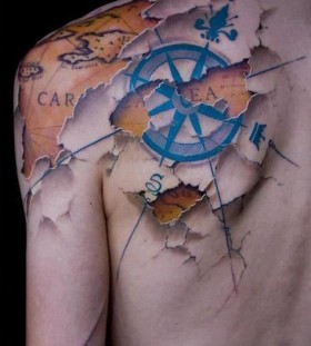 Black ocean and map tattoo on back