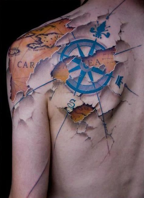 Black ocean and map tattoo on back