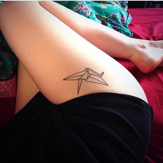 Black ornaments origami tattoo on leg