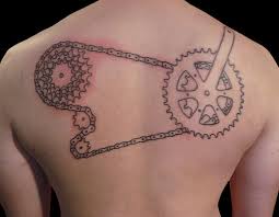 Black parts of bicycle tattoo on back