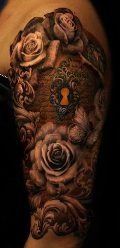 Black roses and keyhole tattoo