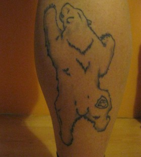 Black simple bear tattoo on leg