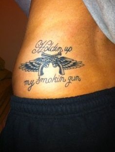 Black wings gun tattoo