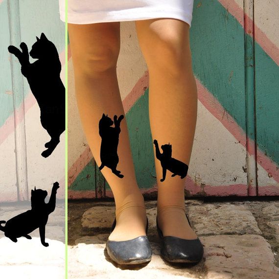 Black women cat tattoo on leg