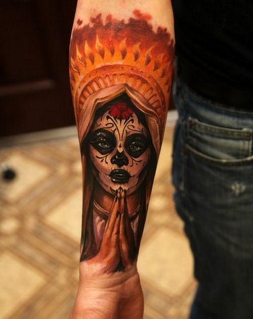 Black women skull tattoo on arm