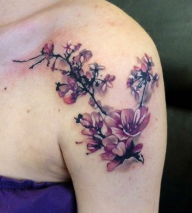 Blossom pink cherry tattoo on arm