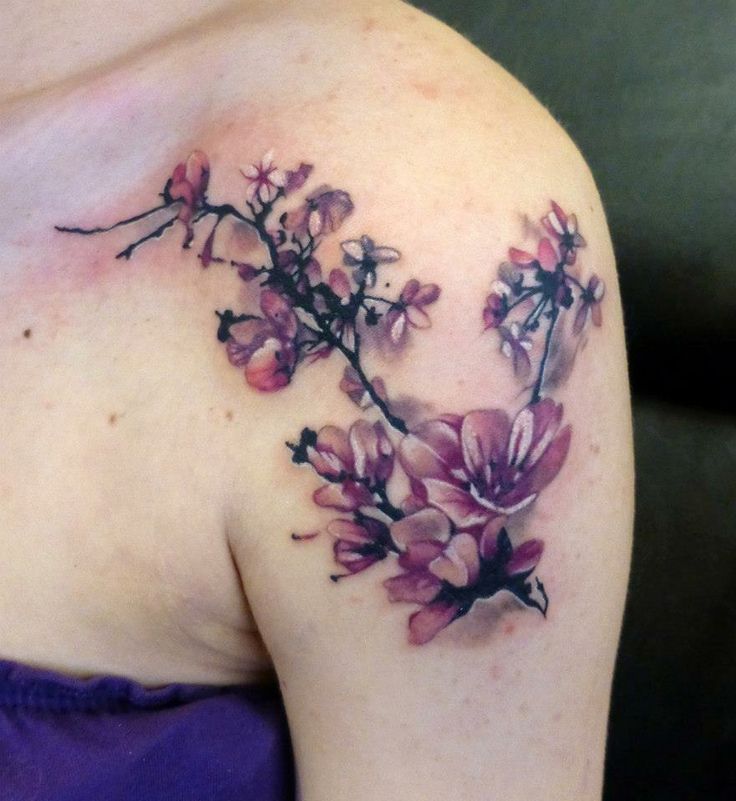 Blossom pink cherry tattoo on arm
