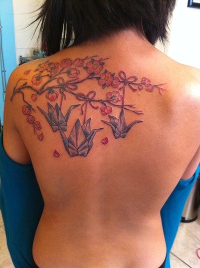 Blue birds and red flowers origami tattoo on shoulder