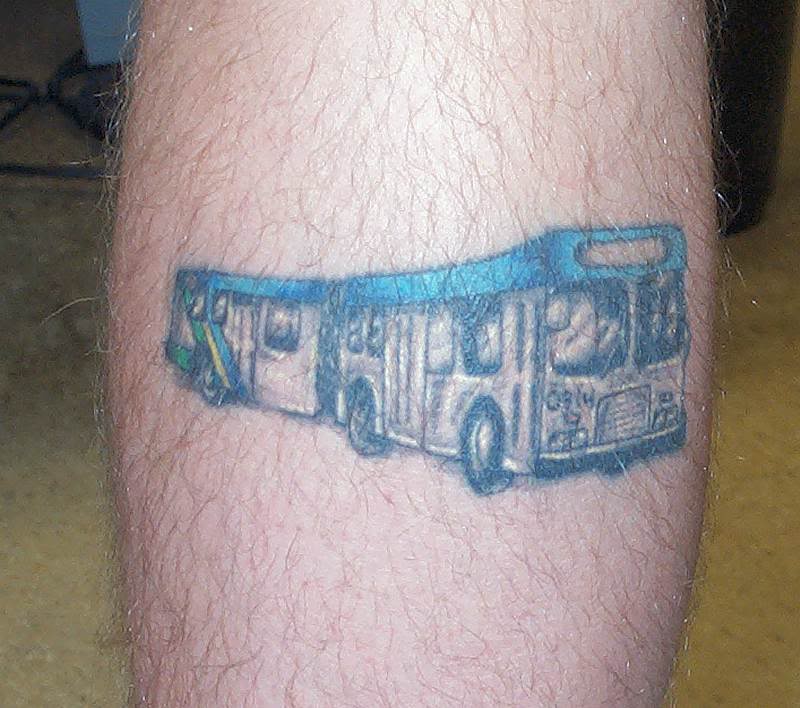 Blue bus car tattoo on leg