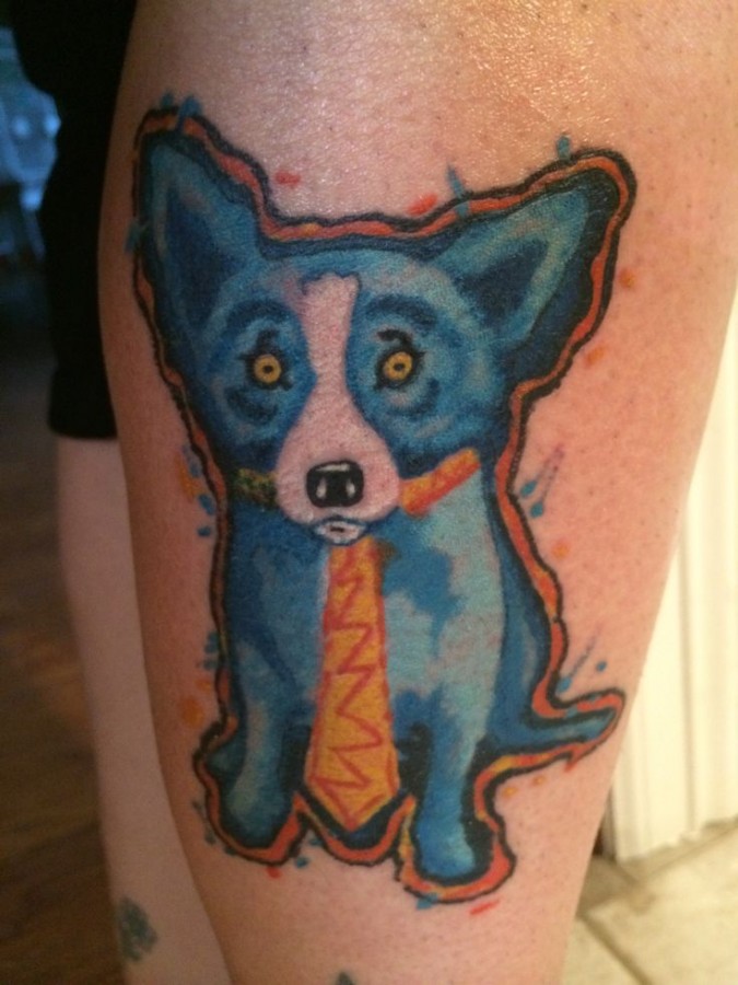 Blue funny dog tattoo on leg