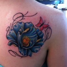 Blue poppy and red butterfly tattooo