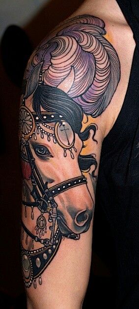 Bracelet and adorable horse tattoo on arm