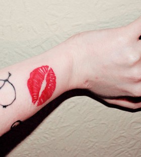 Breathtaking adorable lips tattoo on arm