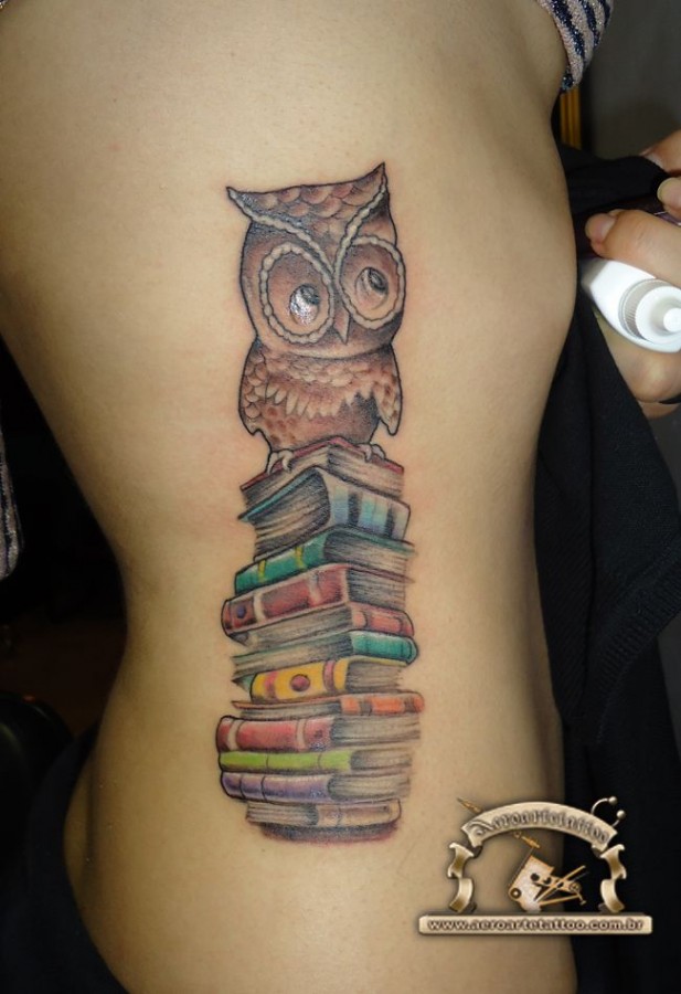 Brown owl and back book tattoo