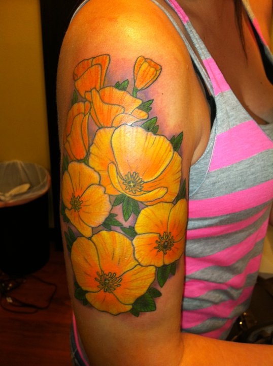 California style poppy tattoo on arm