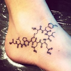 Chemic formula tattoo on foot