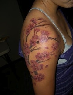 Cherry blossom tree cherry tattoo on arm