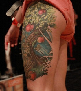 Cherry blossom tree tattoo on leg
