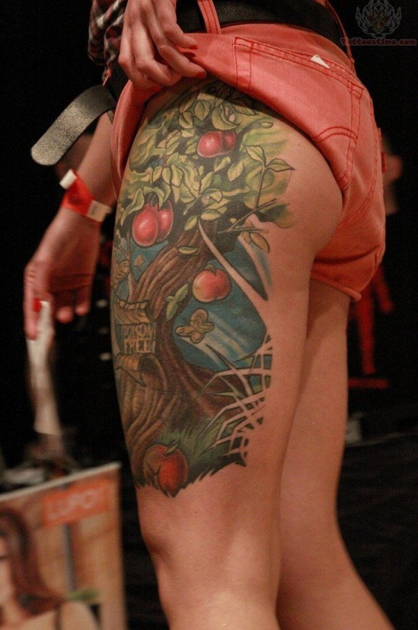 Cherry blossom tree tattoo on leg