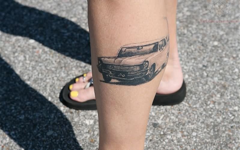 Chevy black car tattoo on leg
