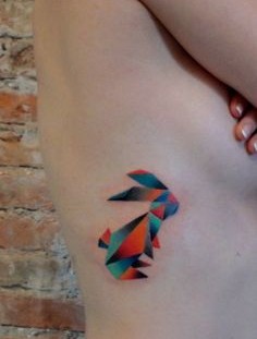Colorful amazing rabbit tattoo on body